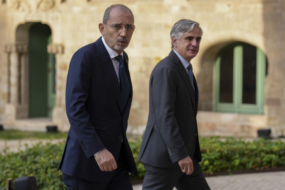 Jordan's Foreign Minister Ayman Safadi, left, arrives at the Union for the Mediterranean event in Barcelona, Spain, Monday, Nov. 27, 2023. Delegations from the European Union member states and from Middle East and northern Africa countries are meeting Monday in Barcelona, Spain, to discuss the crisis in Gaza where a fragile pause in fighting is set to expire. Forty-two delegations will gather at the Union for the Mediterranean event with many represented by their foreign ministers. Israel is not attending. (AP Photo/Emilio Morenatti)