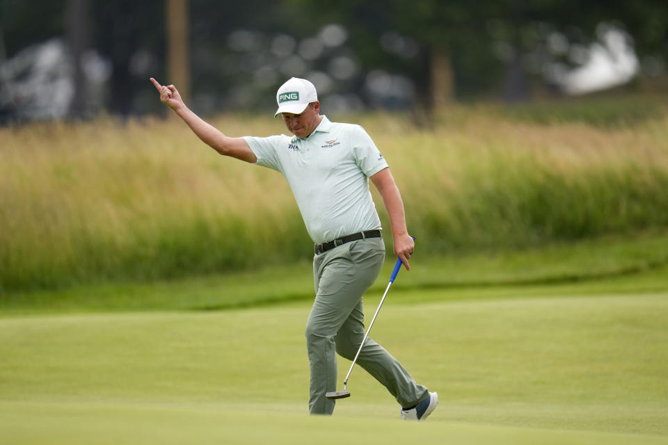 MJ Daffue, of South Africa, reacts to his shot on the seventh hole during the second round of the U.S. Open golf tournament at The Country Club, Friday, June 17, 2022, in Brookline, Mass. (AP Photo/Julio Cortez)