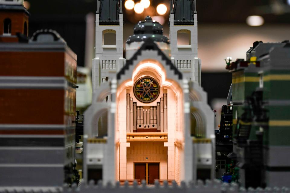 A cathedral is seen in an intricate Lego city built by Mark Lorah, at the Brick Convention at Greenville Shrine Club on Saturday, Aug. 26, 2023. Lorah has worked on his city for a decade.