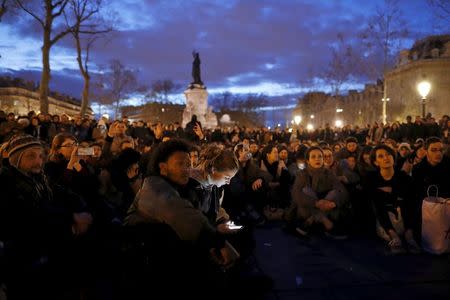 Supporters of social media-driven movement "Nuit Debout" (Up All Night), gather on the Place de la Republique in Paris, France, against a French labour law proposal, April 11, 2016. REUTERS/Benoit Tessier