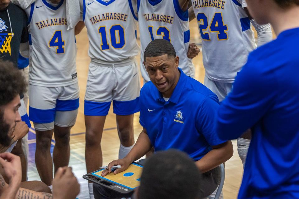 Tallahassee Community College men's basketball coach Rick Cabrera coaches his team during a timeout against Daytona State at the Bill Hebrock Eagledome in Tallahassee, Florida, Monday, December 19, 2022