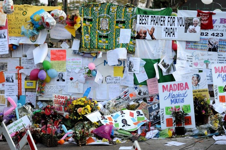 Well wishing messages and flowers left for former South African President Nelson Mandela in Pretoria on July 5, 2013. Mandela's doctors advised his family to turn off the ailing icon's life-support machines last week, a court document has shown, prompting South Africa's government to say he was not "in a vegetative state"