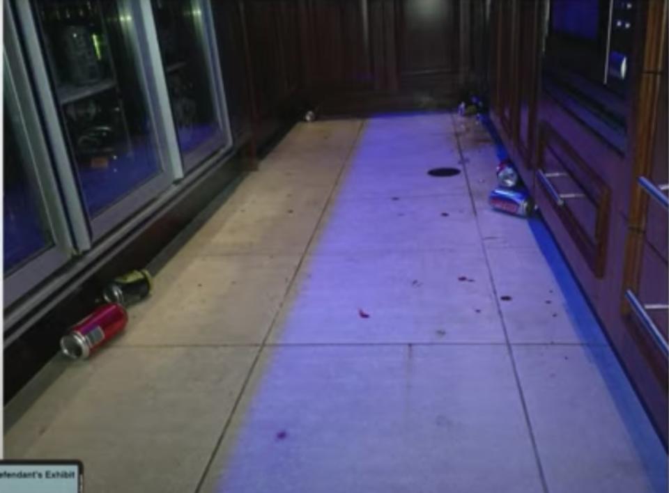 <div class="inline-image__caption"><p>Blood and drink cans left on the tiled floor of their Australian rental property.</p></div> <div class="inline-image__credit">Fairfax County Circuit Court</div>