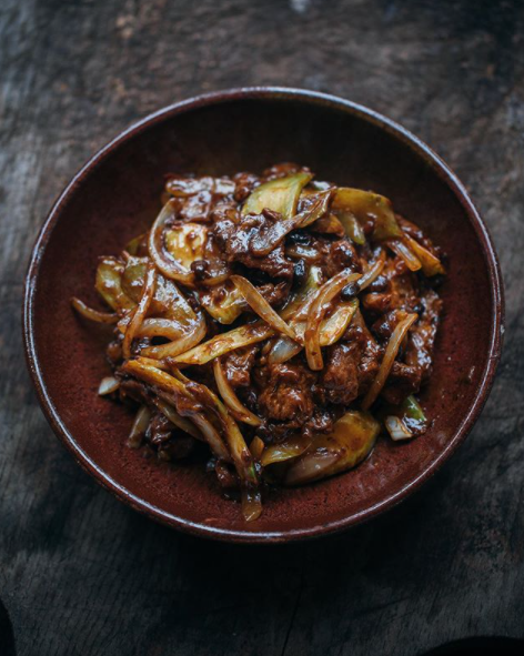 Adam's 'Beef, black beans and broccoli stalks' stir-fry. Photo: Instagram/adamliaw.