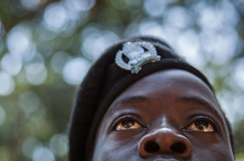 <p>A newly released child soldier attends a release ceremony in Yambio, South Sudan on Feb. 7, 2018. (Photo: Stefanie Glinski/AFP/Getty Images) </p>