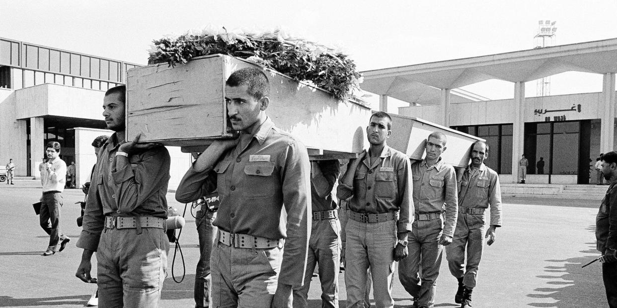 A funeral procession is held for six Pakistani and Indian nationals who were killed aboard Iran Air Flight 655, July 12, 1988, in Iran.