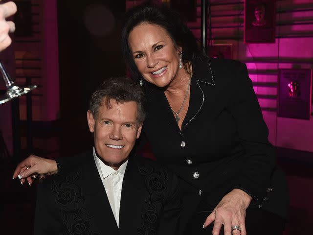 <p>Rick Diamond/Getty</p> Mary Davis and Randy Travis attend Country Music Hall of Fame and Museum New AMERICAN CURRENTS Exhibition on March 14, 2017 in Nashville, Tennessee.