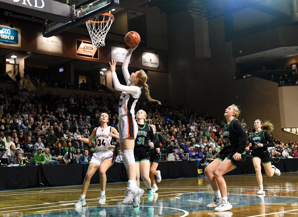 Washington’s Taryn Larson scores in the girls class AA state basketball championship against Pierre on Saturday, March 11, 2023, at the Sanford Pentagon in Sioux Falls.