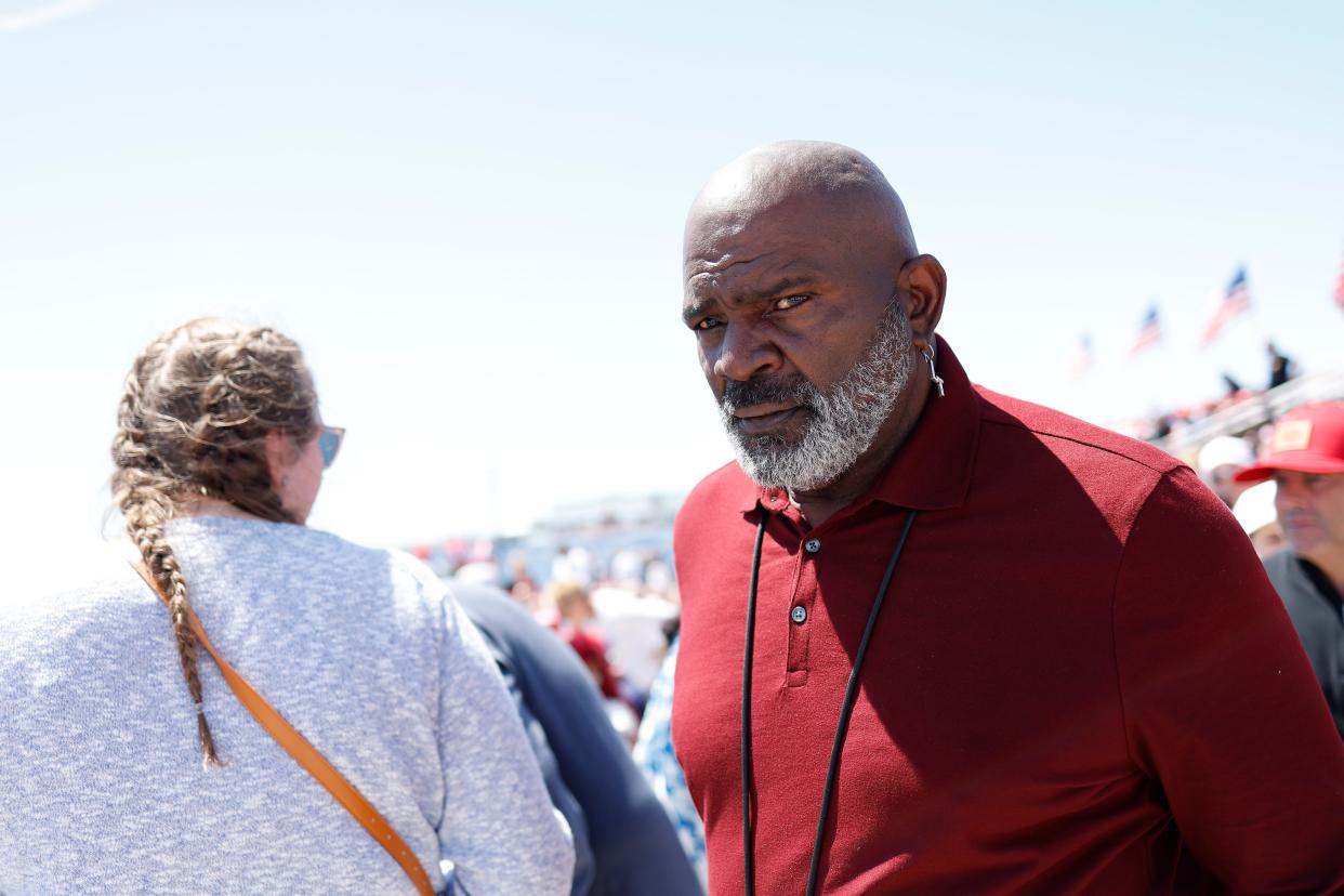 Hall of Fame linebacker Lawrence Taylor arrives at Donald Trump's campaign rally in Wildwood, N.J., on Saturday.