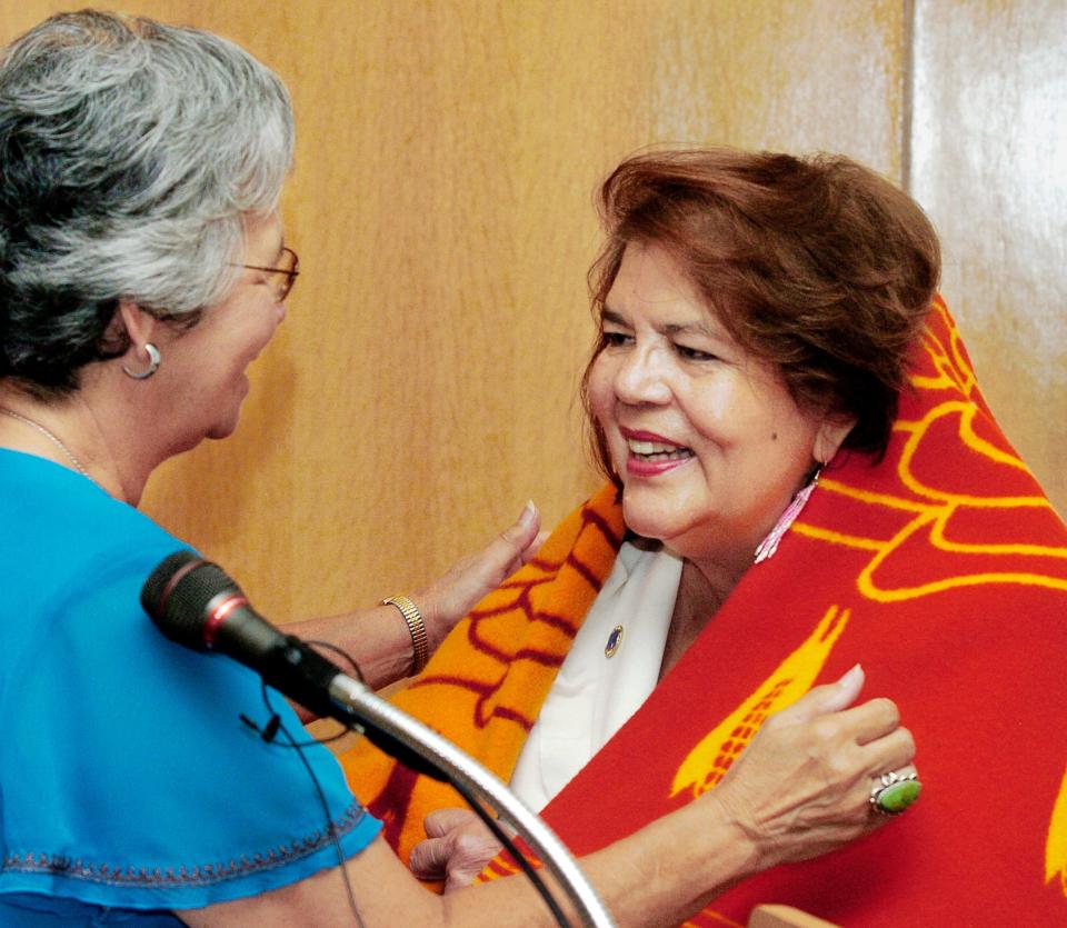 In this file photo, Wilma Mankiller is presented a special edition Pendleton blanket.
