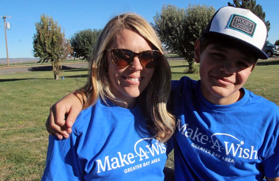 Miles smiles with his mom. (Image courtesy Natalie Scott)