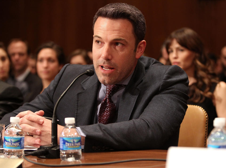 Actor, filmmaker and founder of the Eastern Congo Initiative Ben Affleck testifies before a Senate Appropriations Subcommittee on State, Foreign Operations, and Related Programs hearing on "Diplomacy, Development, and National Security" on March 26, 2015. His wife, Jennifer Garner, looks on.