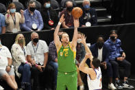 Utah Jazz guard Joe Ingles (2) shoots as Denver Nuggets guard Facundo Campazzo (7) defends during the first half of an NBA basketball game Friday, May 7, 2021, in Salt Lake City. (AP Photo/Rick Bowmer)