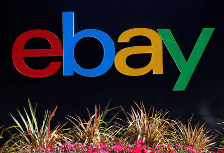 FILE PHOTO: An eBay sign is seen at an office building in San Jose, California, U.S. on May 28, 2014. REUTERS/Beck Diefenbach/File Photo