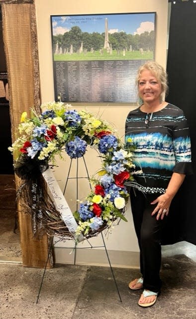 Board of directors member Lisa Pebley created the commemorative wreath.