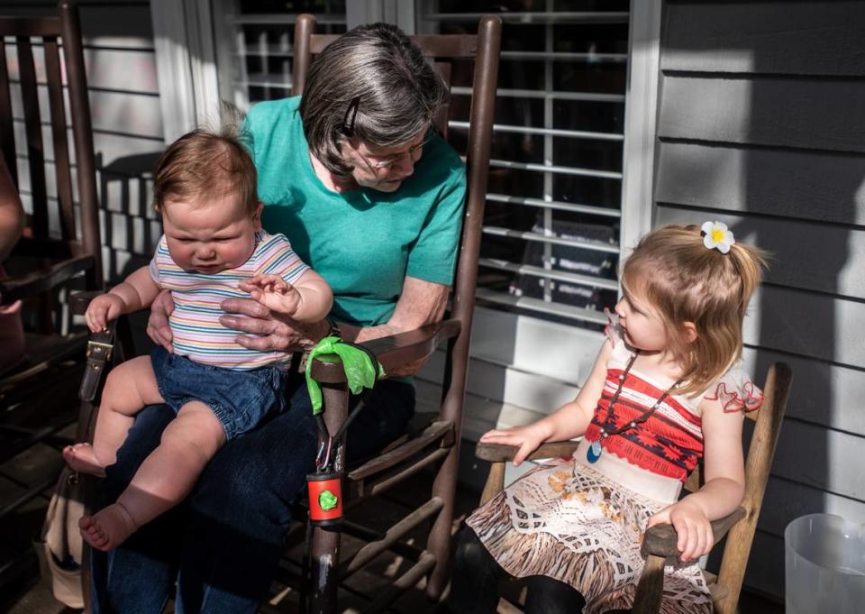Shirley Hoffmann visits with her great grandchildren, Margot Stocker, left, and Grace Stocker in Charlotte, NC, on Monday, April 5, 2021.