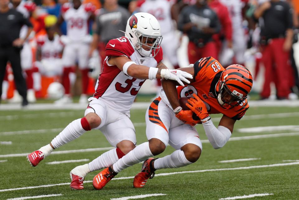 Oct 6, 2019: Cincinnati Bengals wide receiver Tyler Boyd (83) comes down with a pass against Arizona Cardinals cornerback Byron Murphy (33) during the second half at Paul Brown Stadium.