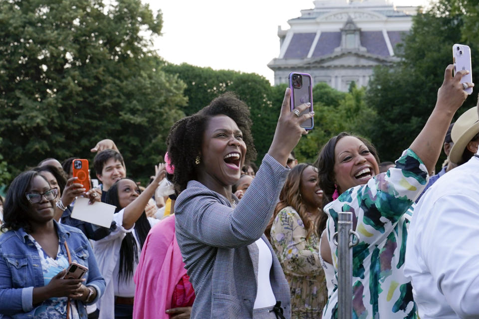 Guests listen during a Juneteenth concert on the South Lawn of the White House in Washington, Tuesday, June 13, 2023. (AP Photo/Susan Walsh)