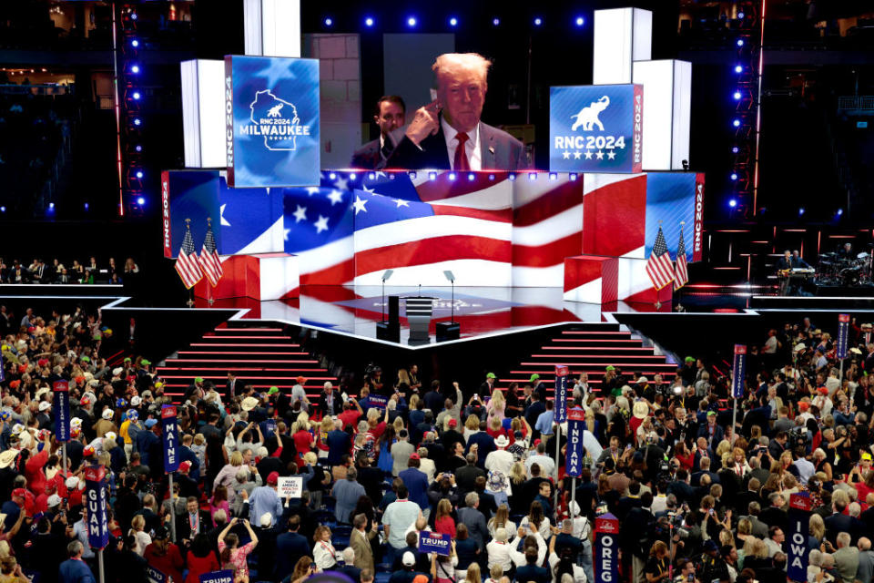 Former President Donald Trump is shown on screen as he arrives to the RNC at the Fiserv Forum in Milwaukee on July 15, 2024.<span class="copyright">Hannah Beier—Bloomberg/Getty Images</span>