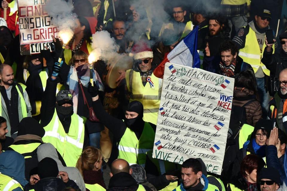 Protesters march during the demonstration (AFP/Getty Images)