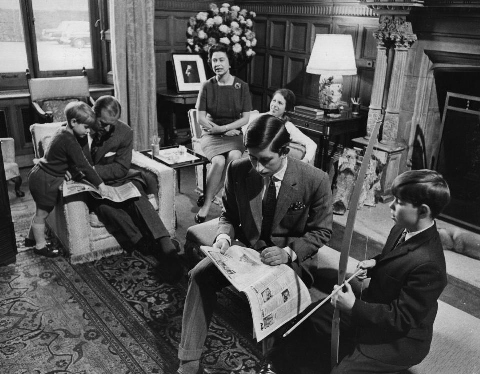The royal family relaxing in a drawing room at Sandringham House in 1969. From left: Prince Edward, Prince Philip, Queen Elizabeth, Princess Anne, then-Prince Charles, and Prince Andrew.