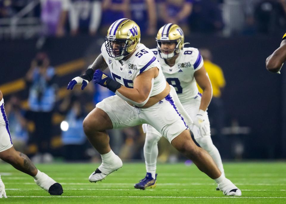 Jan 8, 2024; Houston, TX, USA; Washington Huskies offensive lineman Troy Fautanu (55) against the Michigan Wolverines during the 2024 College Football Playoff national championship game at NRG Stadium. Mandatory Credit: Mark J. Rebilas-USA TODAY Sports