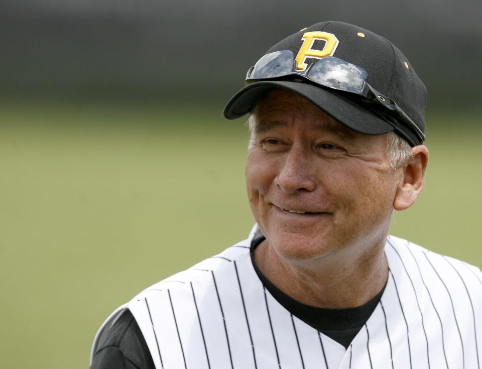 Former Perry High School head baseball coach Frank Gamble enjoys a moment during a 2011 game.