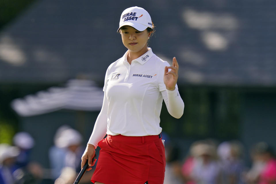 Sei Young Kim, of South Korea, waves to the gallery after making a birdie putt on the 14th hole during the final round of the LPGA Pelican Women's Championship golf tournament Sunday, Nov. 22, 2020, in Belleair, Fla. (AP Photo/Chris O'Meara)