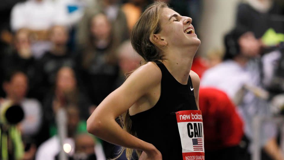 Mary Cain reacts after breaking the high school girls' record during the women's two mile event at the New Balance Indoor Grand Prix track meet in 2013. - Jessica Rinaldi/Reuters/File