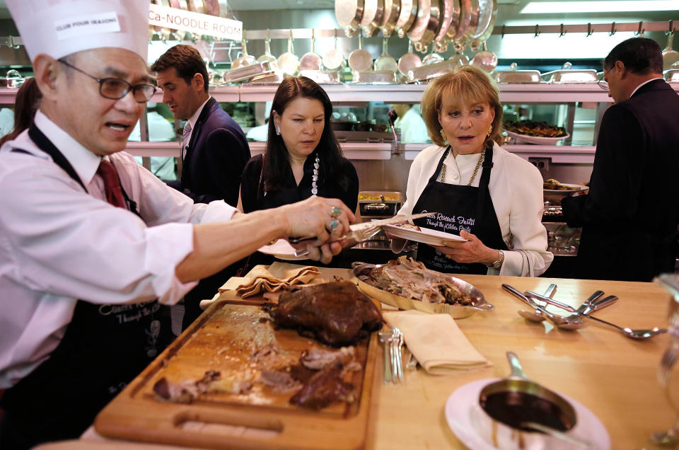 NEW YORK, NY - MAY 20:  Media personality Barbara Walters is served in the kitchen during the Through The Kitchen Benefit For Cancer Research Institute at The Four Seasons Restaurant on May 20, 2012 in New York, United States.  (Photo by Jemal Countess/Getty Images)