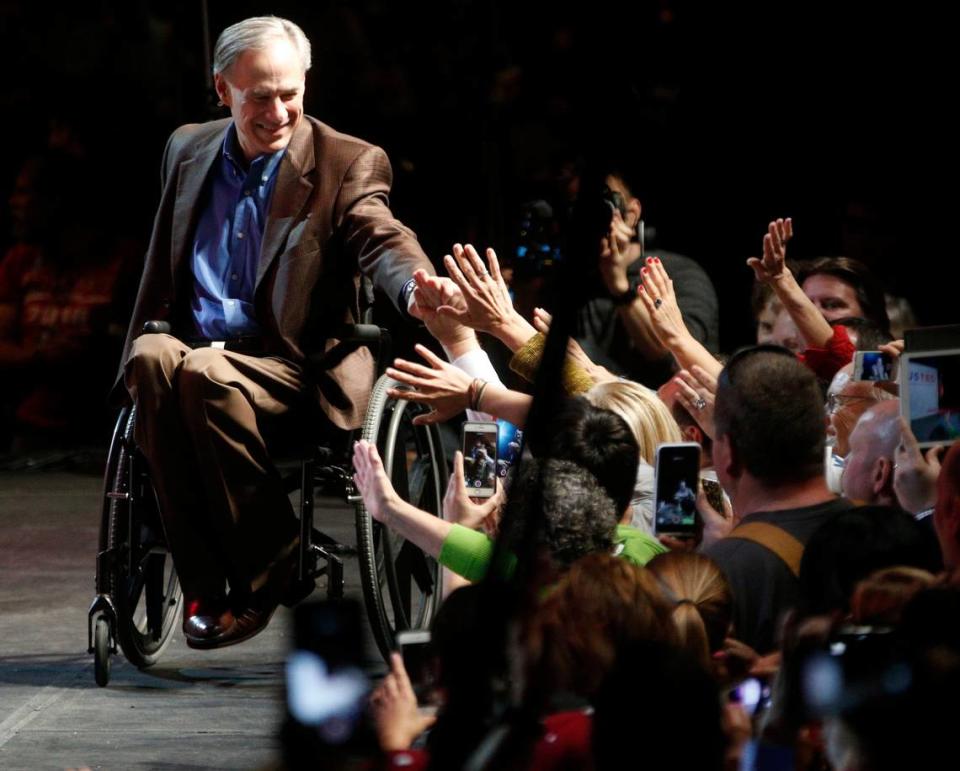 Texas Governor Gregg Abbott shakes hands with the crowd during the Republican presidential candidate Sen. Ted Cruz rally at Gilley’s Dallas the day before Super Tuesday on Feb. 29, 2016 in Dallas. (Nathan Hunsinger/Dallas Morning News/TNS)