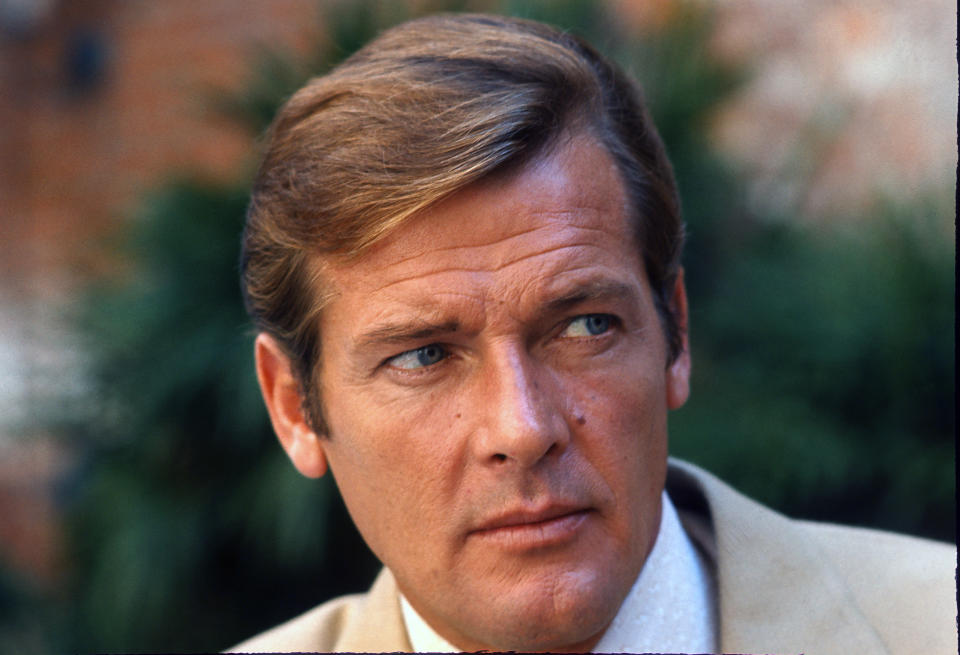 KINGSTON, JAMAICA - MARCH 1: Roger Moore poses on location for the filming of James Bond film 'Live And Let Die' on March 1, 1973 in Kingston, Jamaica (Photo by Anwar Hussein/Getty Images)