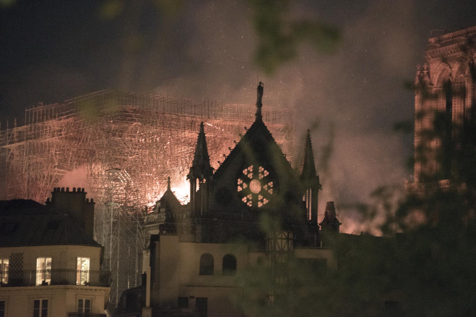 Flames and smoke rise from a fire at the Notre Dame Cathedral. Source: Getty