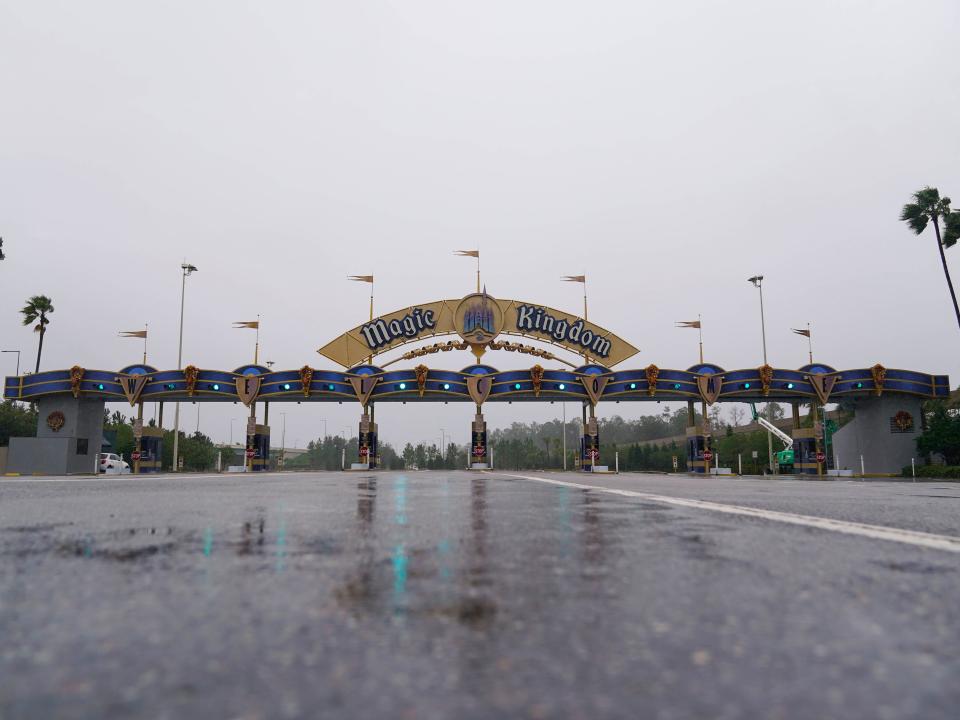 The entrance to the Walt Disney theme park is seen as the park is closed as Hurricane Ian bears down on Florida, Wednesday, Sept. 28, 2022, in Lake Buena Vista, Fla.