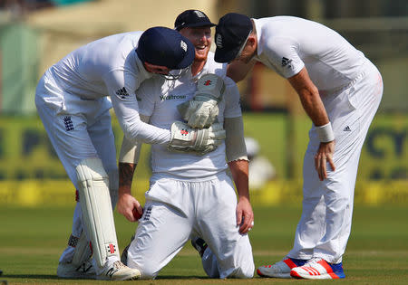 Cricket - India v England - Second Test cricket match - Dr. Y.S. Rajasekhara Reddy ACA-VDCA Cricket Stadium, Visakhapatnam, India - 20/11/16. England's Ben Stokes (C) celebrates after taking a catch to dismiss India's Virat Kohli. REUTERS/Danish Siddiqui