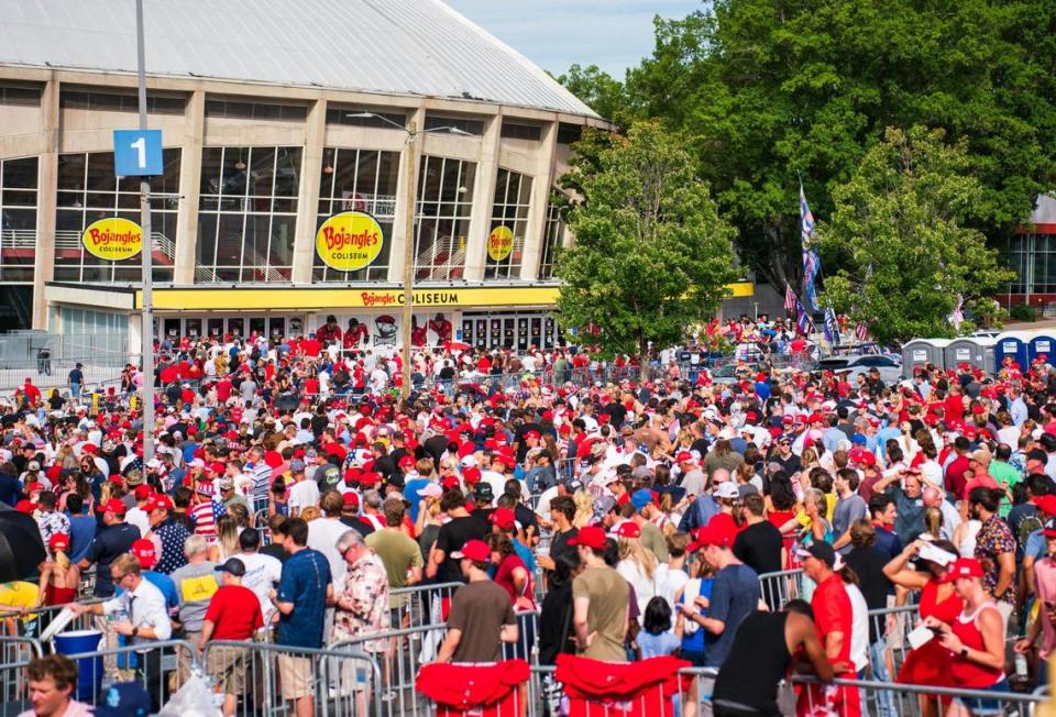 A crowd stands outside while former President Donald Trump begins to speak at the Bojangles Coliseum in Charlotte on July 24, 2024. Many people were still just coming in as Trump began speaking.