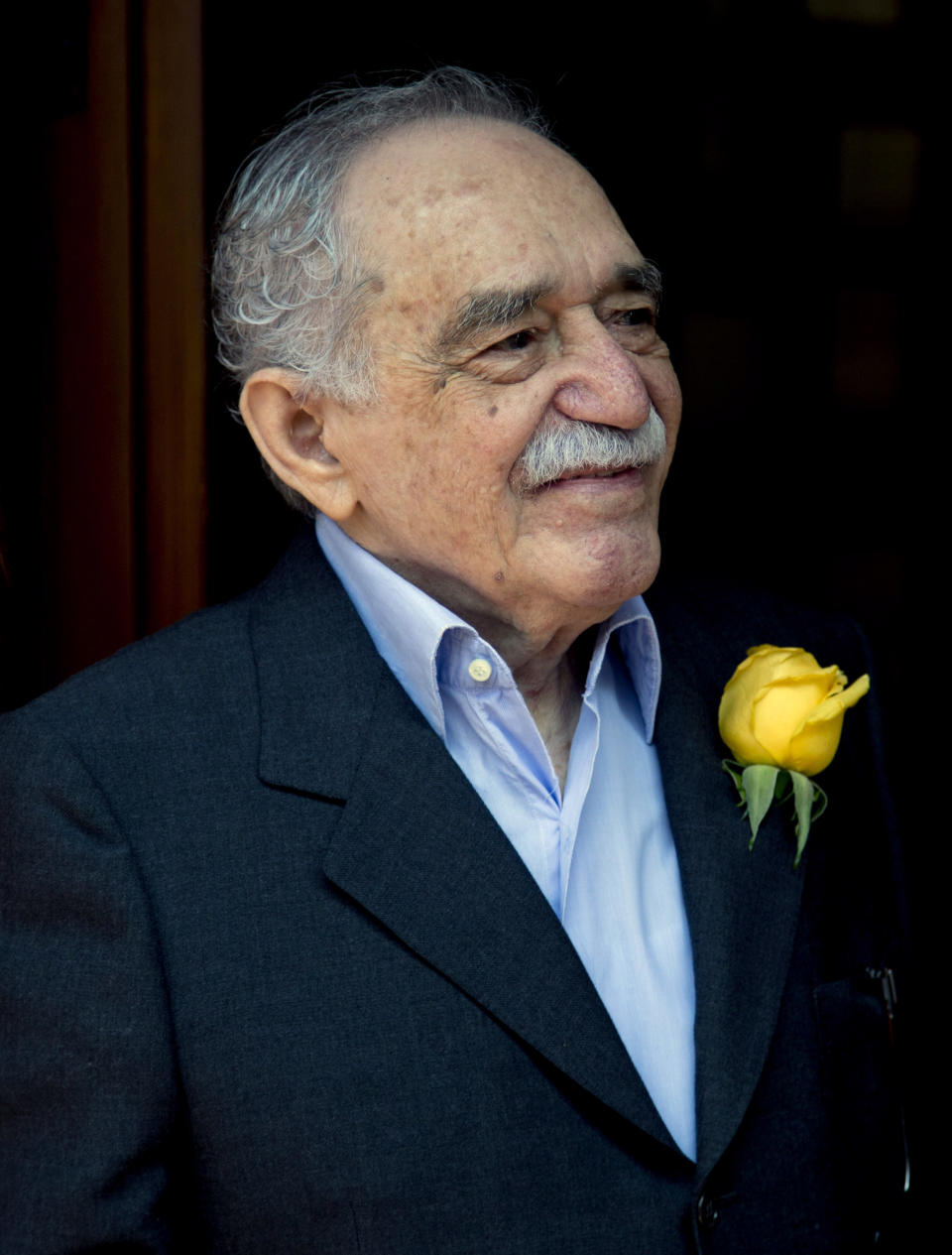 FILE - In this March 6, 2014, file photo, Colombian Nobel Literature laureate Gabriel Garcia Marquez greets fans and reporters outside his home on his birthday in Mexico City. Garcia Marquez, known as "Gabo" in Latin America, turned 87. Marquez has been hospitalized, Thursday April 3, 2014, at a local hospital in Mexico City. (AP Photo/Eduardo Verdugo, File)