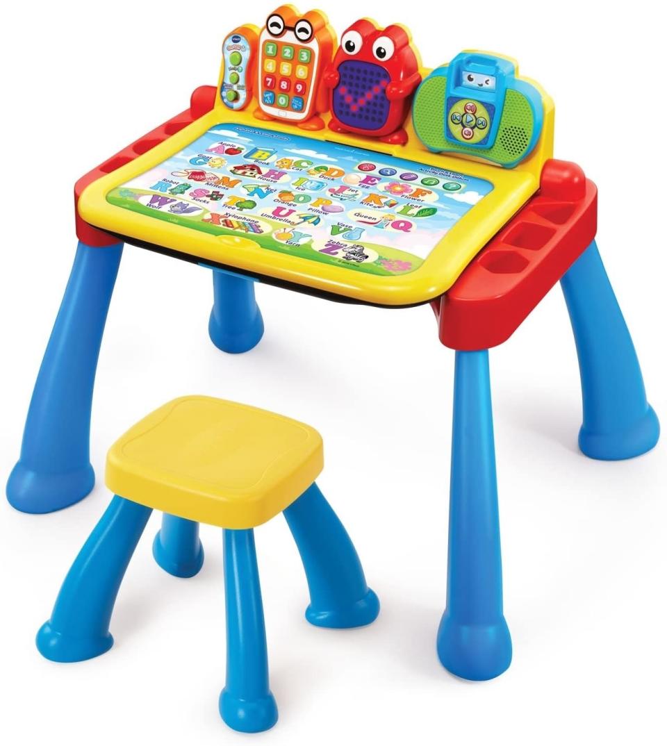 With five interactive pages and more than 200 "touch and learn spots" on each card &mdash; plus a music player, toy phone and LED light-up display &mdash;  this desk is here for nonstop learning and playtime. Also, it transforms from a desk into an easel and chalkboard for more lo-fi fun.<br /><br /><strong>Promising review:</strong> "I've had this for over a year and my son still plays with it. <strong>The key is to get the expansion pack to rotate the different activities.</strong> My son was a late talker (he's starting to pick it up), but one day he was playing with the desk and it would ask him to pick number x and he chose the number. He was consistently picking the right number. He wasn't talking yet but knew numbers 1 through 9. I was a little shocked because this was before we had to send him to daycare. <strong>Having the extra cards to change out keeps him interested and it helps reinforce what he's learning in school.</strong> It's the first thing he plays with when he gets home." &mdash; <a href="https://amzn.to/3gEDJ9M" target="_blank" rel="noopener noreferrer">Islandblue</a>﻿<br /><strong><br />Get it from Amazon for <a href="https://amzn.to/3gEDJ9M" target="_blank" rel="noopener noreferrer">$69.90</a>.</strong>