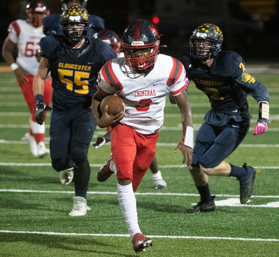 Willingboro's Lamar Best runs the ball during the Central Jersey Group 2 football final playoff game between Willingboro and Gloucester, played at Gloucester High School on Friday, November 11, 2022. 