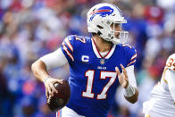 Buffalo Bills quarterback Josh Allen (17) looks to pass during the first half of an NFL football game against the Washington Football Team, Sunday, Sept. 26, 2021, in Orchard Park, N.Y. (AP Photo/Adrian Kraus)