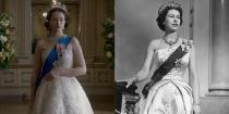 <p>While both <em>The Crown </em>and the Queen's royal portrait dresses were elegant and regal, there were quite a few differences. Both were adorned with the monarch's sash and medals, but the show's lace design was much softer than Queen Elizabeth's satin embroidered gown. </p>