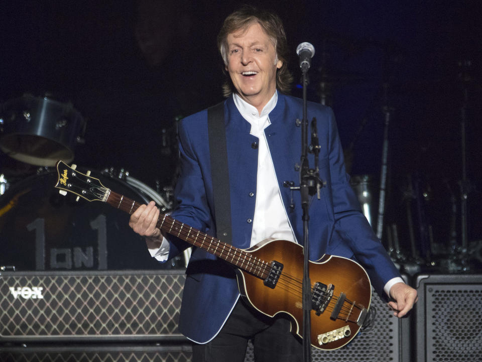 FILE - In this Monday, July 10, 2017 file photo, Paul McCartney performs at Amalie Arena in Tampa, Fla. McCartney scored his 79th Grammy nominations this year — as an art director. The former Beatle is nominated for best boxed or special limited edition package for the collector's edition of his 10th solo album, “Flaming Pie." He's listed as one of the art directors on the project, and shares his nomination with Linn Wie Andersen, Simon Earith and James Musgrave. (AP Photo/Scott Audette, FILE)