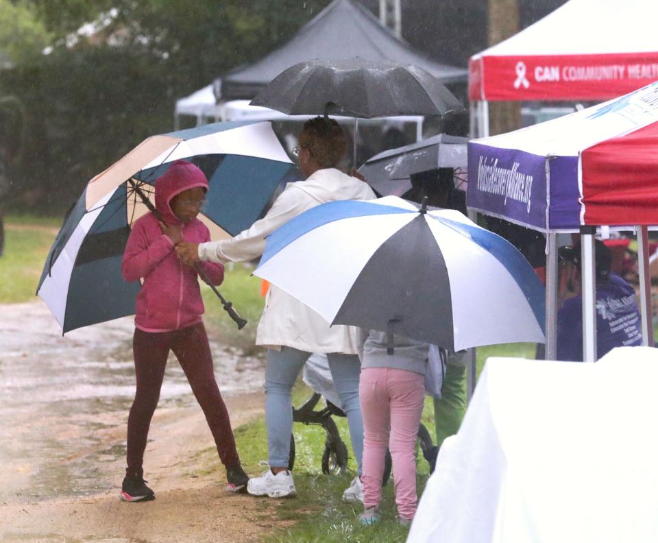 Rain couldn't dampen the spirits of those  attending Juneteenth festivities in Daytona Beach.