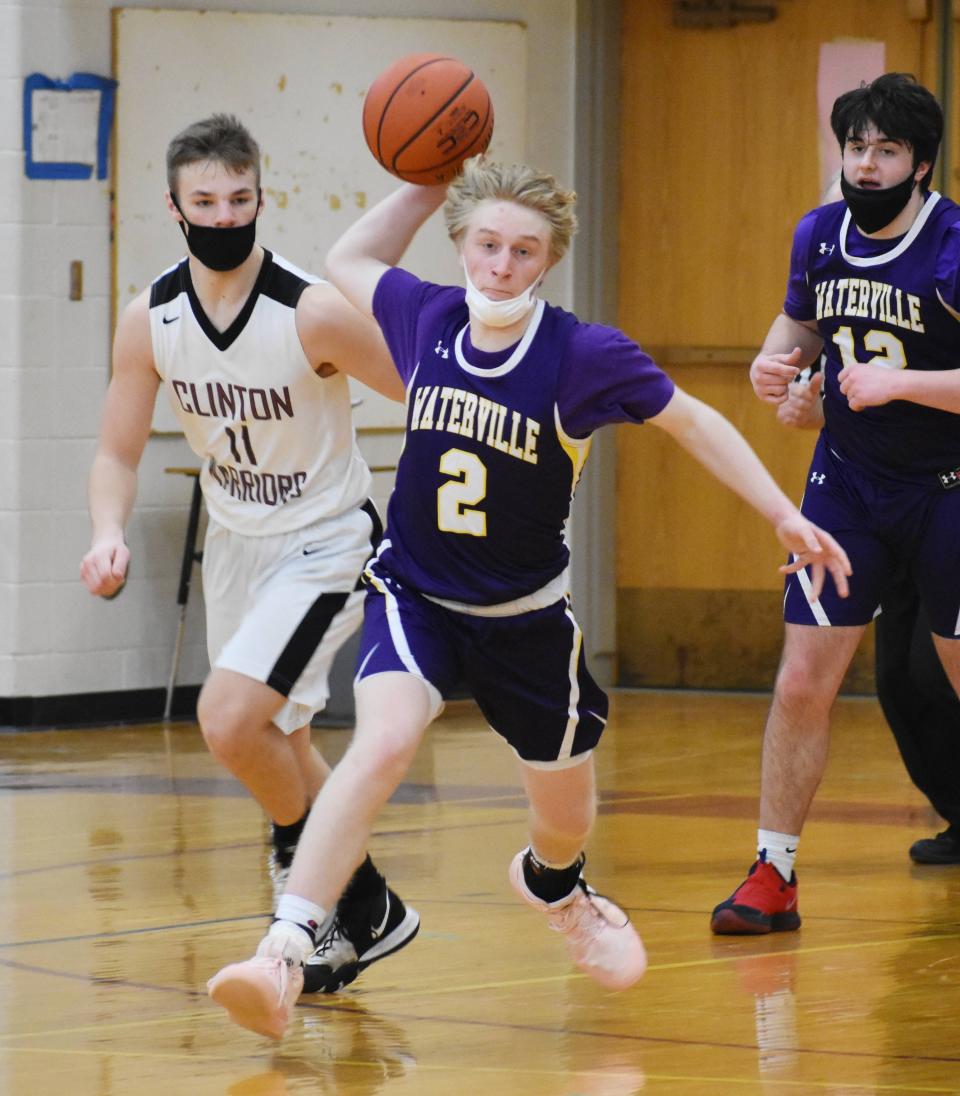 Waterville's Tyson Maxam throws an outlet pass during a March 13, 2021, game in Clinton. Maxam scored 35 points Thursday and became the all-times scoring leader at Waterville. He also broke the school record for three-pointers.