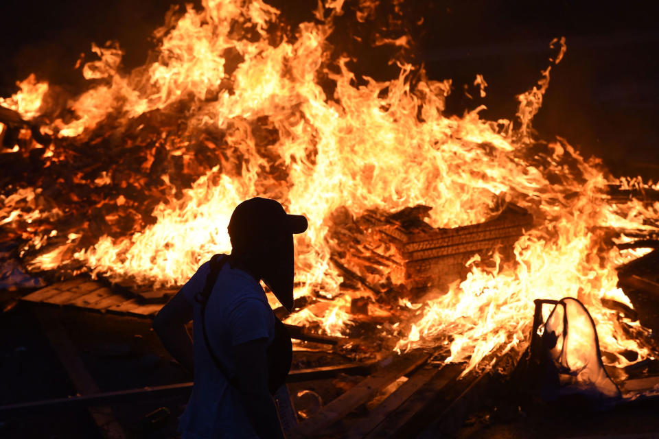 <p>Protesters have set barricades alight on July 7, 2017 in Hamburg, northern Germany. (Christof Stache/AFP/Getty Images) </p>