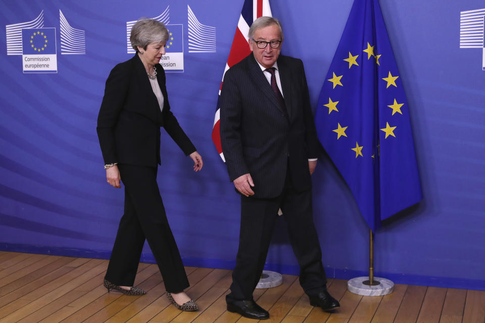 British Prime Minister Theresa May, left, is greeted by European Commission President Jean-Claude Juncker prior to a meeting at EU headquarters in Brussels, Wednesday, Feb. 20, 2019. European Commission President Jean-Claude Juncker and British Prime Minister Theresa May meet Wednesday for their latest negotiating session to seek an elusive breakthrough in Brexit negotiations. (AP Photo/Francisco Seco)