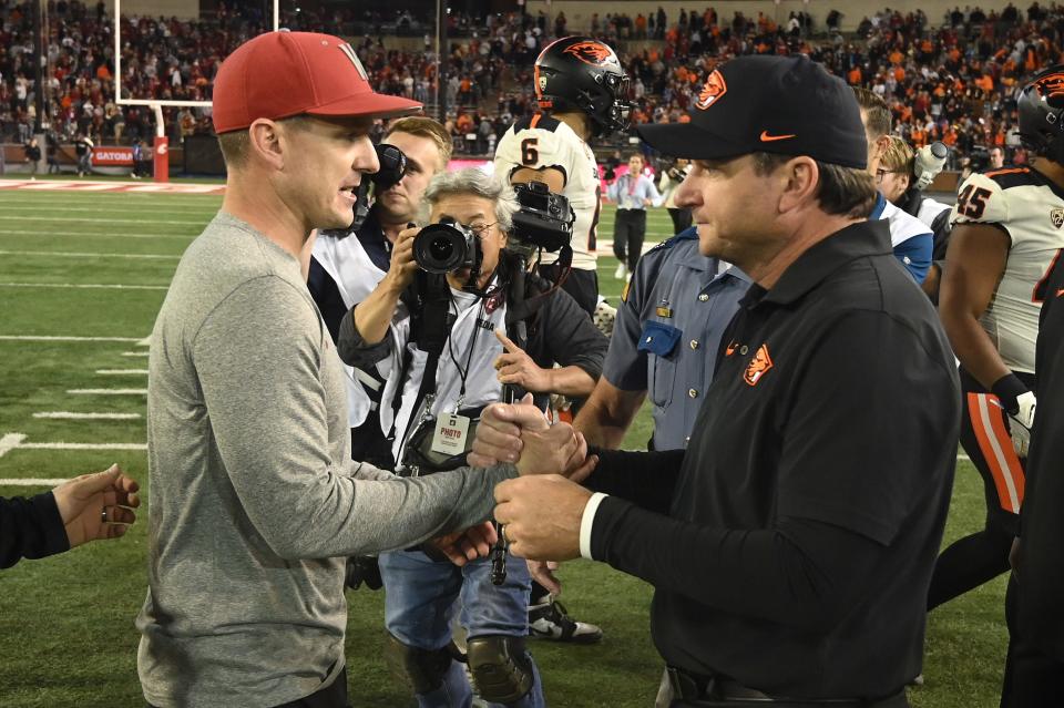 Washington State Cougars head coach Jake Dickert shakes hands with Oregon State Beavers head coach Jonathan Smith after a 38-35 victory at Gesa Field at Martin Stadium in Pullman, Washington, on Saturday, Sept. 23, 2023.