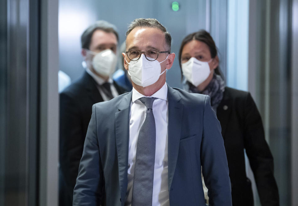 Heiko Maas, German Foreign Minister, arrives in the Bundestag for a special session of the Foreign Affairs Committee on the crisis in Afghanistan in Berlin, Germany, Wednesday, Aug. 18, 2021. (Bernd von Jutrczenka/dpa via AP)