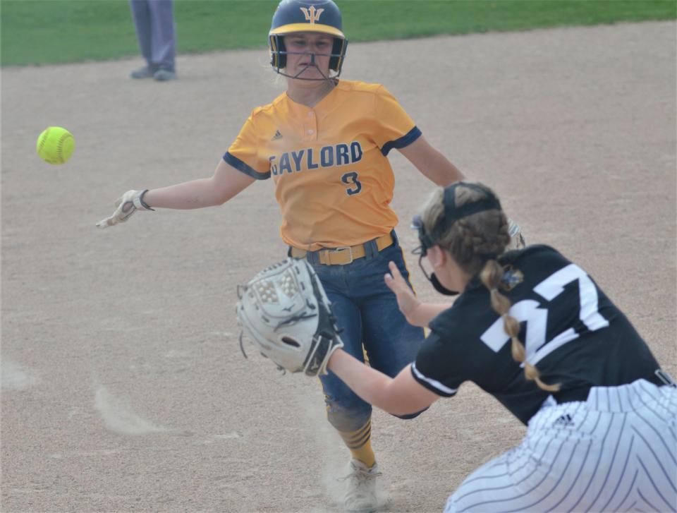 Alexis Shepherd slides into third base during a high school softball matchup between Gaylord and Traverse City Central on Tuesday, May 16.