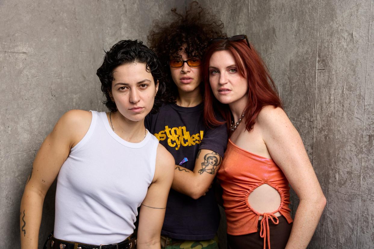 The members of MUNA (from left, Josette Maskin, Naomi McPherson and Katie Gavin) pose for a portrait backstage at Austin City Limits Music Festival.